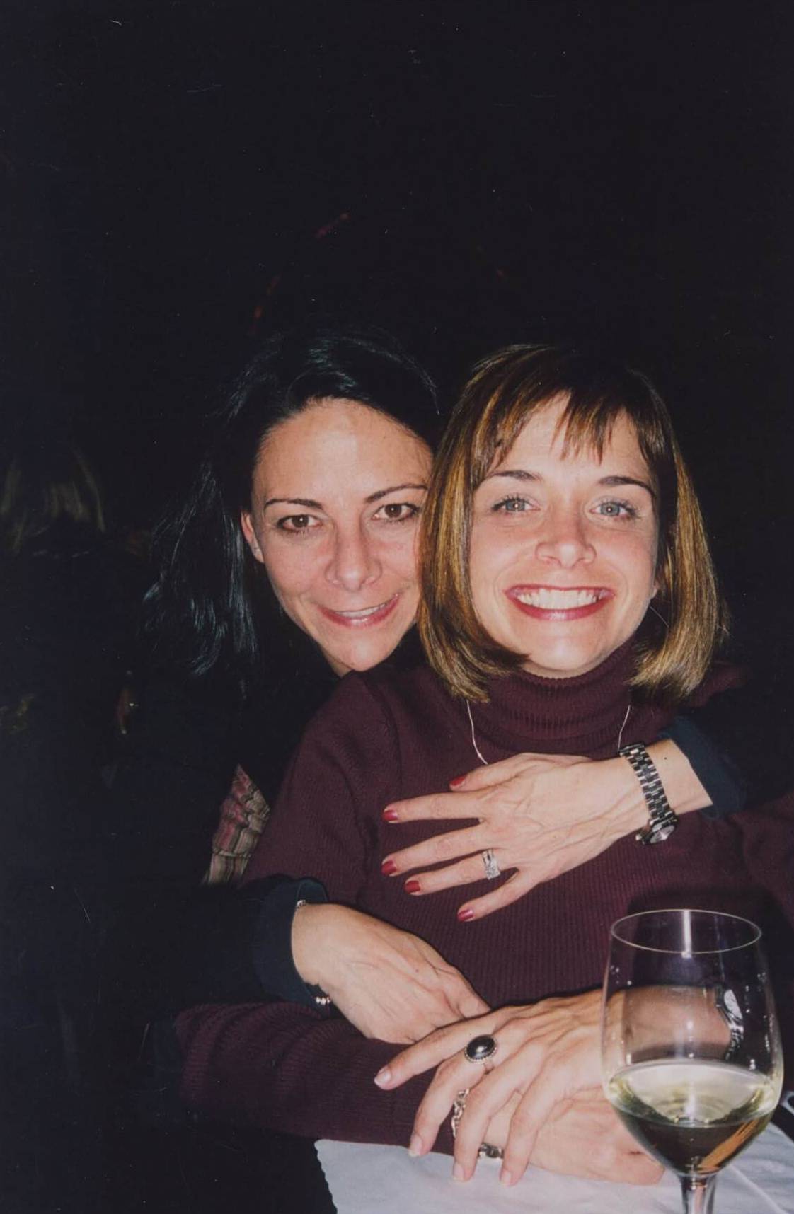 Rafferty and friend embrace